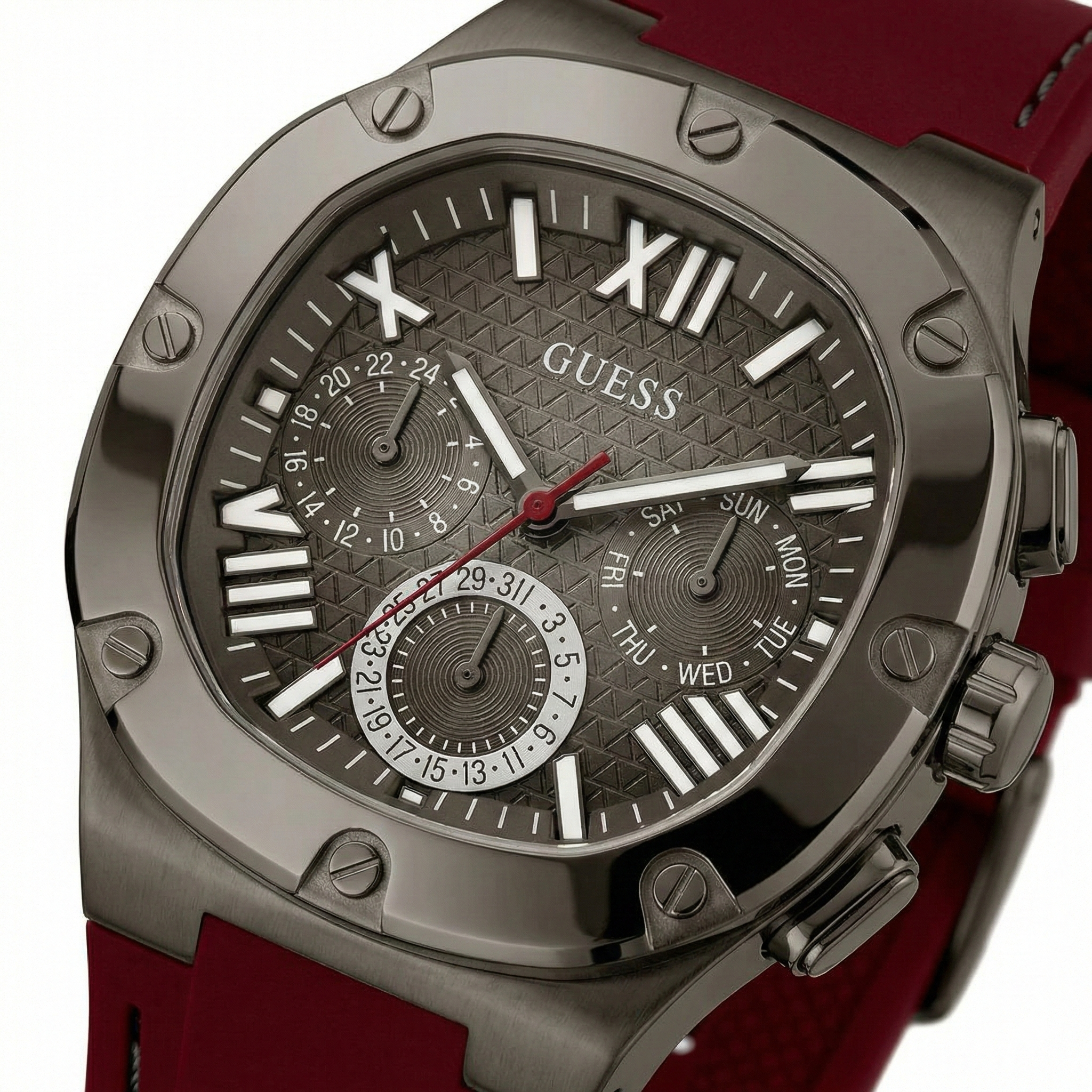 Close up shot of Guess GW0571G4 on wrist highlighting the black grid dial texture and red strap contrast