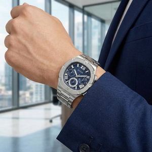 AI lifestyle shot of a man wearing the elegant silver and blue Guess Headline watch