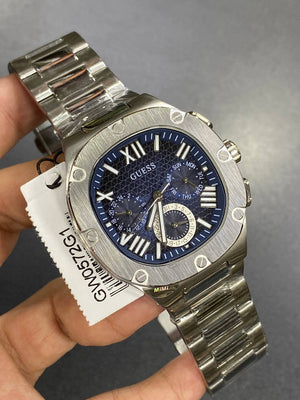 Real-life image of Guess GW0572G1 showing the actual blue dial contrast and silver shine