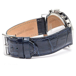 Authentic real-life photo of the Guess Horizon W0380G3 watch showing actual silver case and blue leather strap