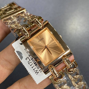 Authentic real-life photo of the Guess Mod Heavy Metal W1117L3 watch showing actual rose gold finish