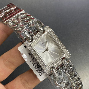 Authentic real-life photo of the Guess Mod Heavy Metal W1121L1 watch showing actual silver chain and crystals