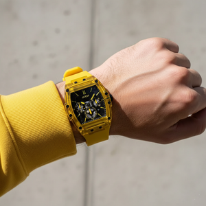 Man wearing Guess Phoenix GW0203G6 yellow sport watch with a casual outfit