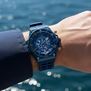 Man wearing Guess Treasure GW0443G1 blue sport watch with an outdoor outfit