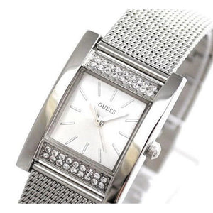 Side profile view of the 9mm silver case of the Guess W0127L1