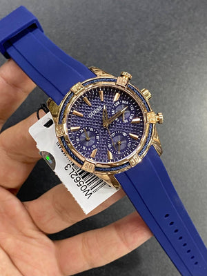 Real-life photo of Guess Catalina W0562L3 watch in hand showing actual colors