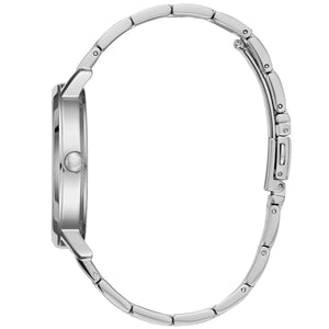 Angled view of Guess W0933L1 highlighting the polished silver-tone case and integrated stainless steel bracelet