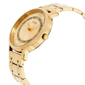 Angled view of Guess W0933L2 highlighting the polished gold-tone case and integrated stainless steel bracelet