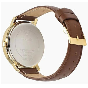 Gold-tone buckle on the genuine brown leather strap of the Guess W0934L3
