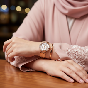 Female model wearing Guess W1008L3 rose gold watch with an elegant evening dress