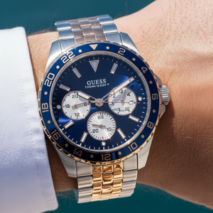 Close up shot of Guess W1107G3 on wrist highlighting the blue dial and white sub-dials