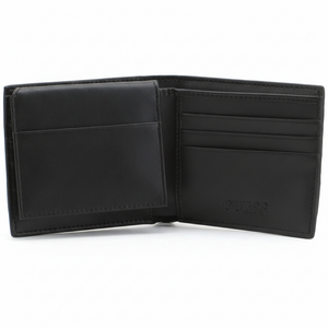 Fully open interior view of a Guess men's black leather wallet featuring a snap-button coin pocket on the left, card slots on the right, and debossed branding