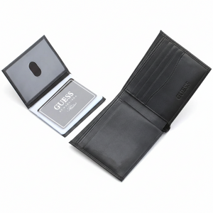 Fully open interior view of a Guess men's black leather wallet showcasing a clear ID window passcase on the left and a snap-button coin pocket on the right