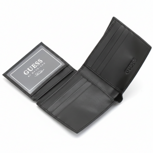 Fully open interior view of a Guess men's black leather passcase wallet showcasing multiple card slots, debossed branding, and an attached flip-out ID window