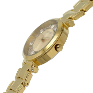 Side profile of Guess Crystal Clear GW0470L2 women's quartz battery watch showing 9mm thickness and polished gold finish