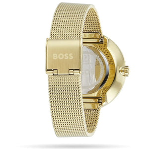 Perspective view of the radiant crystal dial and gold hands of Hugo Boss watch