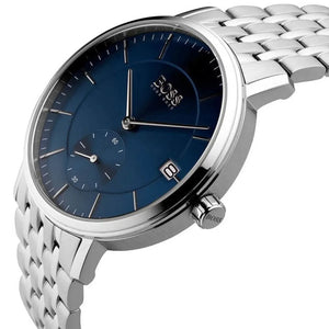Half-face lifestyle shot of a man with fair skin wearing bracelets and rings on the same hand as the Hugo Boss Corporal silver metal watch for a sophisticated everyday look