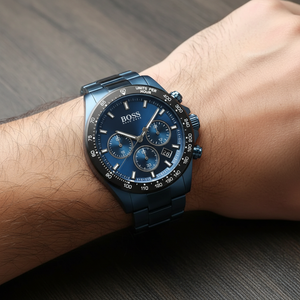 Detailed macro view of the blue sunray dial and black tachymeter bezel of Hugo Boss 1513758