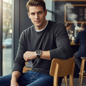 Male model wearing Hugo Boss Grandmaster 1513881 silver watch with a business suit