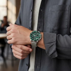 Male model wearing Hugo Boss Admiral 1513905 green watch with a sporty outfit