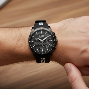 Detailed macro view of the black horizontal grooved dial and sub-dials of Hugo Boss 1514289