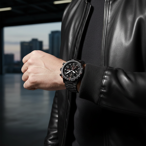 Male model wearing Hugo Boss Aero Mate 1513771 all-black watch with a tactical casual outfit