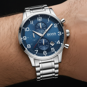 Close up shot of Hugo Boss Aeroliner 1513183 watch on wrist showing the blue dial and Arabic numerals