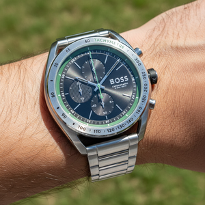 Close up shot of Hugo Boss Center Court 1514023 watch on wrist showing the green tachymeter details