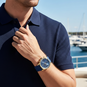 Male model wearing Hugo Boss Globetrotter 1513822 gold watch with a casual chic outfit