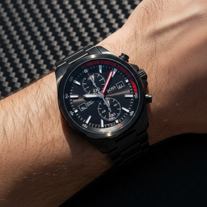 Male model wearing Hugo Boss Globetrotter 1513825 black metal watch with a bold sporty outfit