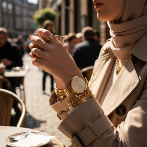 Woman wearing elegant all-gold Hugo Boss Majesty 1502532 watch