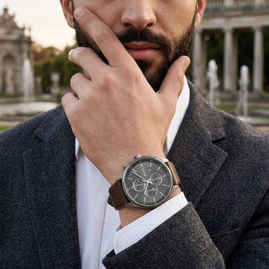 Lifestyle luxury shot featuring Hugo Boss Peak 1514187 chronograph men's watch.