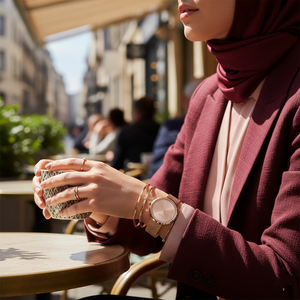 Woman wearing elegant Hugo Boss Praise 1502548 watch with rose gold mesh strap