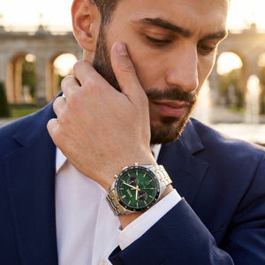 Lifestyle luxury shot featuring Hugo Boss Tourmaster 1514287 dual time men's watch.
