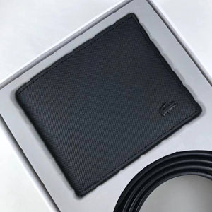 Top down view of Lacoste Gift Set box containing black Piqué wallet and rolled belt strap