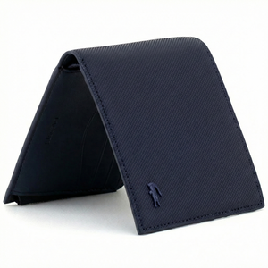 Perspective view of a standing semi-open Lacoste men's navy blue textured leather bifold wallet showcasing the matching tonal navy crocodile logo