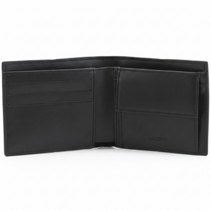 Interior view of an open Lacoste men's black leather wallet showcasing card slots on the left, debossed branding, and a snap-button coin pocket on the right