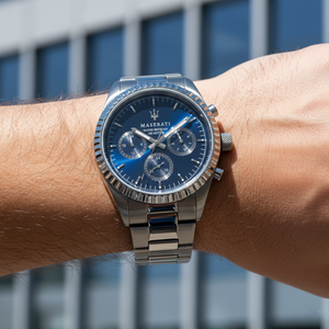 Close up shot of Maserati Competizione R8853100019 on wrist showing the blue sunray dial and day-date sub-dials