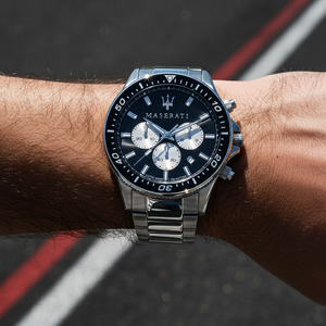 Close up shot of Maserati Sfida R8873640004 watch on wrist showing the black dial and silver sub-dials