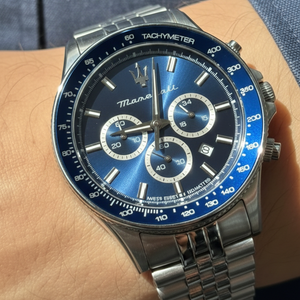 Close up shot of Maserati Sfida R8873640025 on wrist showing the blue sunray dial and chronograph sub-dials