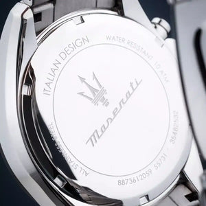 Close-up of a Maserati watch caseback with branding and specifications.