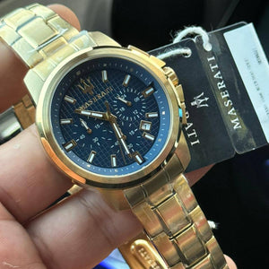 Authentic real-life photo of Maserati Successo R8873621021 showing actual gold shine and navy blue dial pattern