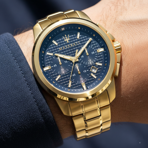 Close up shot of Maserati Successo R8873621021 on wrist showing the navy blue textured dial and gold trident logo