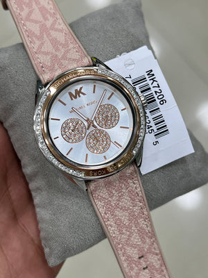 Authentic product photography of the Michael Kors MK7206 Jessa showing the elegant pink, rose gold, and silver color contrast