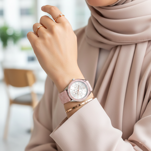Detailed view of the pink rubber strap with embossed Michael Kors MK logo pattern for the Jessa watch