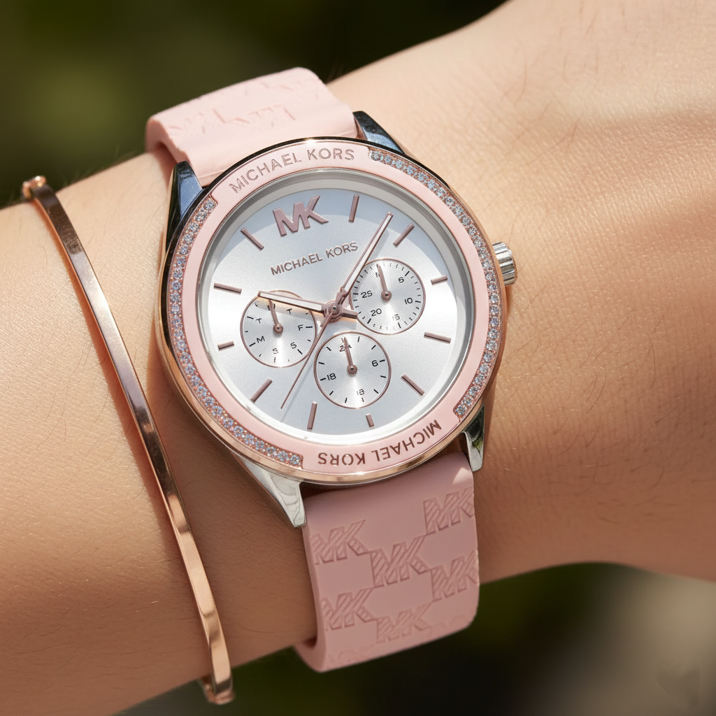 Close up of the MK7268 silver dial showing rose gold-tone indices and multifunction sub-dials