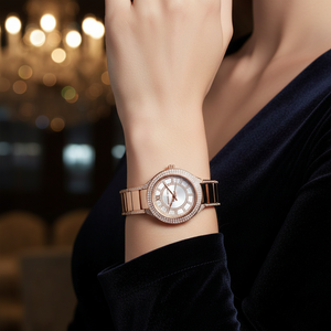 Elegant woman wearing Michael Kors MK3443 rose gold glitz watch on hairless wrist