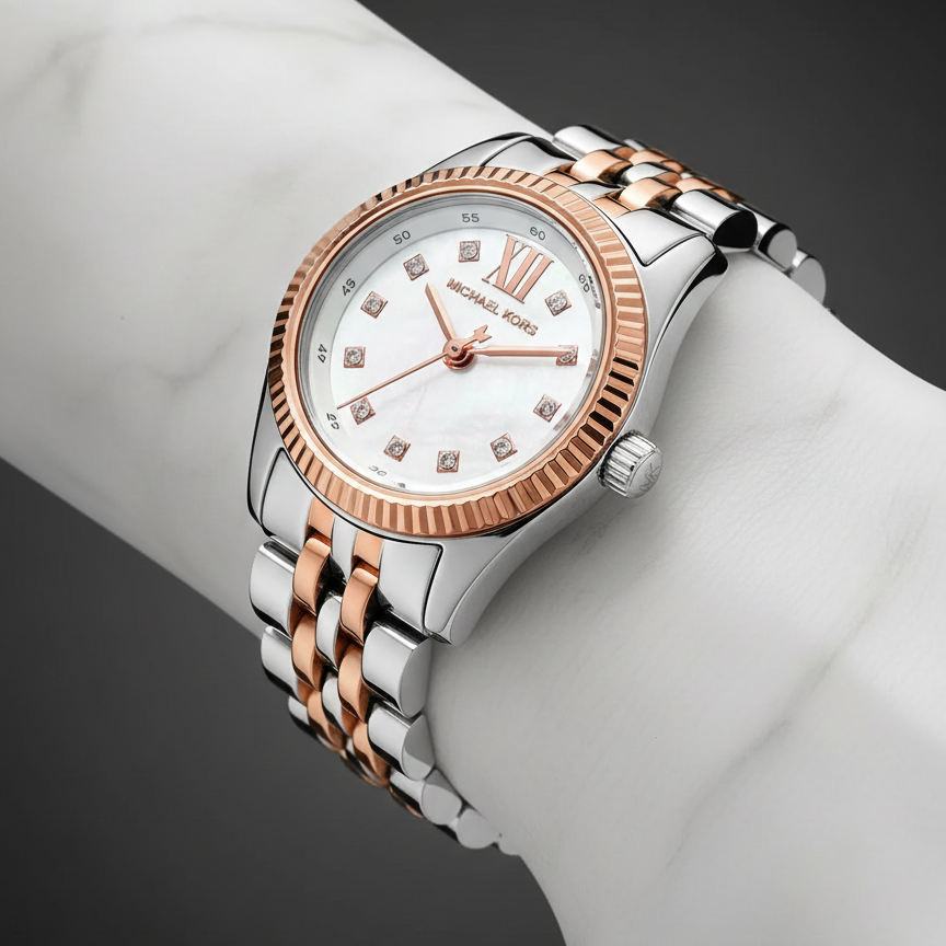 Close-up of Michael Kors MK4817 white dial with crystal indices and rose gold fluted bezel