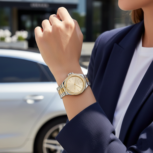 Sporty chic woman wearing Michael Kors MK6988 two-tone watch on smooth hairless wrist