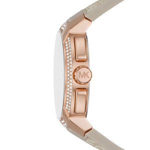 Side profile of the polished rose gold-tone case and textured crown on the Michael Kors MK6949